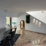 Апартаменти Ponderosa Ocean View